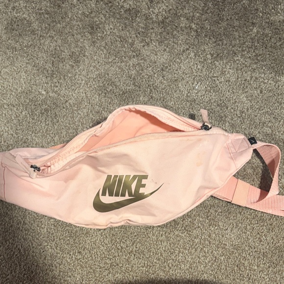Nike Handbags - Nike Pink Crossbody Waist Bag with Gold Logo
